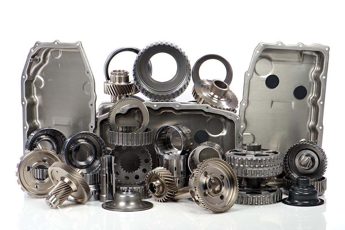Assorted polished transmission gears on white