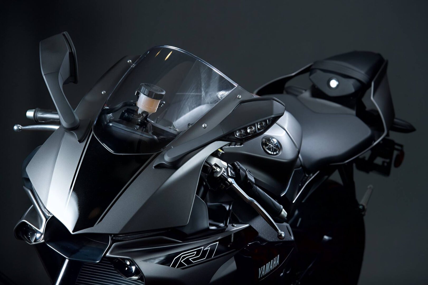 Sport motorcycle front fairing and windshield